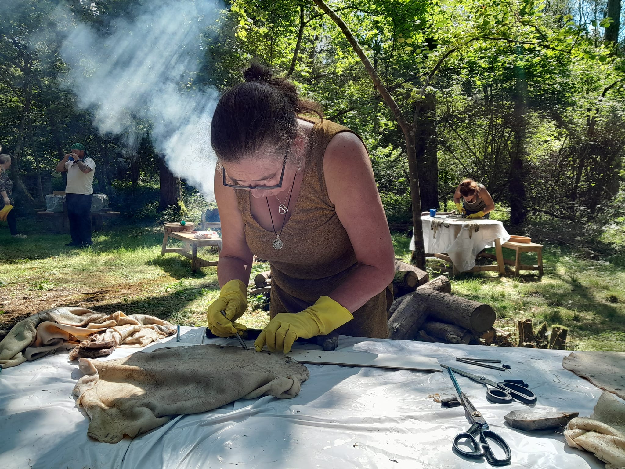 People cutting skins ready for drum making